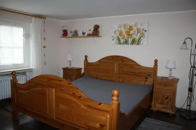 Ein Bett oder Betten in einem Zimmer der Unterkunft Ferienhaus Lilli