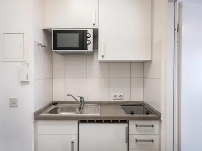 Küche/Küchenzeile in der Unterkunft Apartment Wiesenblick - A706 by Interhome