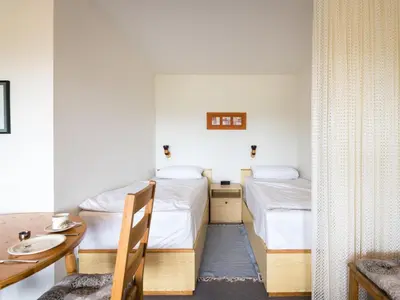 Ein Bett oder Betten in einem Zimmer der Unterkunft Apartment Kiefer - A907 by Interhome