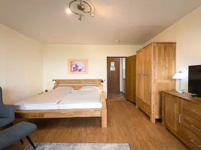Ein Bett oder Betten in einem Zimmer der Unterkunft Apartment Relax - B907 by Interhome