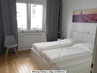 Ein Bett oder Betten in einem Zimmer der Unterkunft Ferienwohnung im Herzen der Koblenzer Altstadt