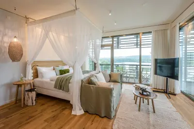 Ein Bett oder Betten in einem Zimmer der Unterkunft Seezeitlodge Hotel & Spa
