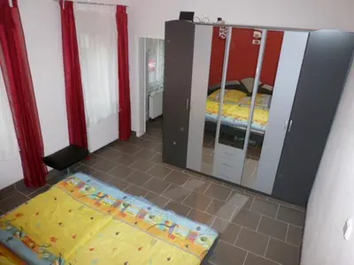 Ein Bett oder Betten in einem Zimmer der Unterkunft Ferienwohnung Pretz