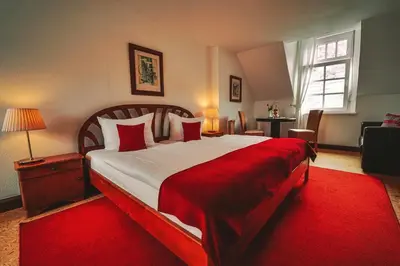 Ein Bett oder Betten in einem Zimmer der Unterkunft Landgasthaus am Ufer