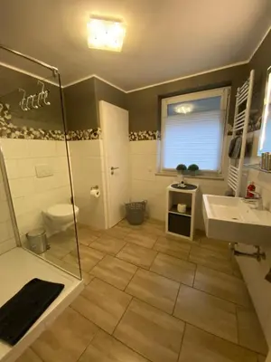 Ein Badezimmer in der Unterkunft Ferienwohnung Ambiente II und III