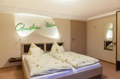 Ein Bett oder Betten in einem Zimmer der Unterkunft Gänschen klein