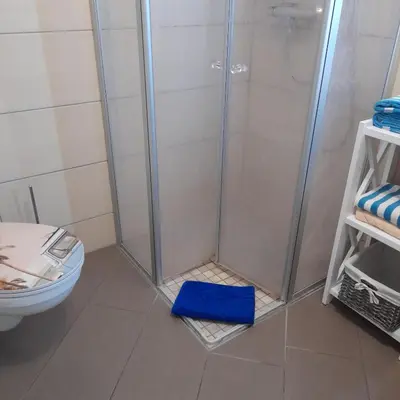 Ein Badezimmer in der Unterkunft FeWo Sonnenblume mit sauna