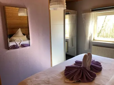 Ein Bett oder Betten in einem Zimmer der Unterkunft Ferienhaus Sternenhimmel
