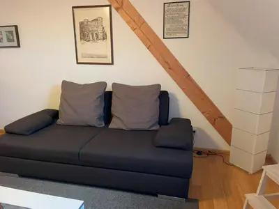 Ein Sitzbereich in der Unterkunft Ferienwohnung Kirchturmblick Euren