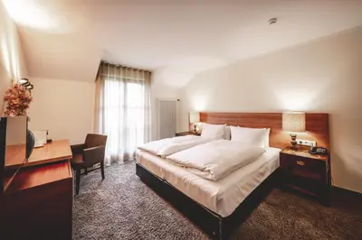 Ein Bett oder Betten in einem Zimmer der Unterkunft Marienhöh - Hideaway & Spa