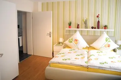 Ein Bett oder Betten in einem Zimmer der Unterkunft be Clemense