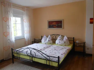 Ein Bett oder Betten in einem Zimmer der Unterkunft Ferienhaus Weins
