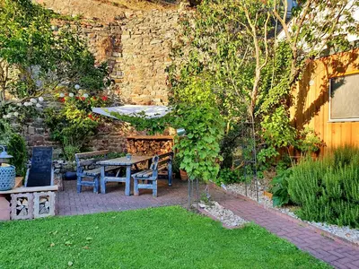 Ein Garten an der Unterkunft Gästehaus Klostergasse