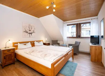 Ein Bett oder Betten in einem Zimmer der Unterkunft Ferien Weingut Pauly
