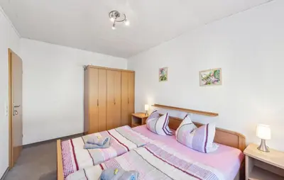 Ein Bett oder Betten in einem Zimmer der Unterkunft Cozy Home In Strohn With Kitchen