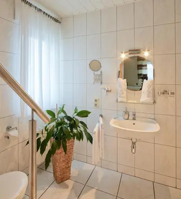 Ein Badezimmer in der Unterkunft Gästehaus Alexanderhof