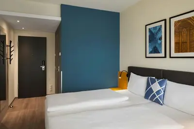Ein Bett oder Betten in einem Zimmer der Unterkunft Four Points Flex by Sheraton Koblenz
