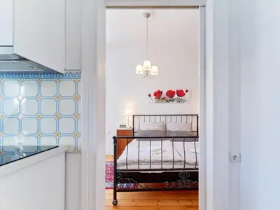 Ein Bett oder Betten in einem Zimmer der Unterkunft BG Living & Hosting - Stilvolles Jugendstilhaus am Marktplatz - Top-Lage im Zentrum