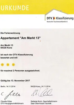 Ein Zertifikat, Auszeichnung, Logo oder anderes Dokument, das in der Unterkunft Apartment Am Markt 13 ausgestellt ist