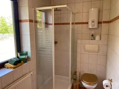 Ein Badezimmer in der Unterkunft Ferienwohnungen Park Café am Kurpark
