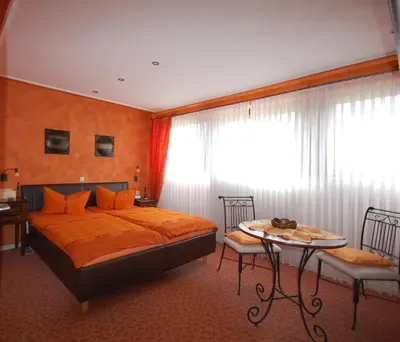 Ein Bett oder Betten in einem Zimmer der Unterkunft Ferien-Wein-Gut Keifer