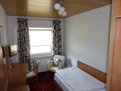 Ein Bett oder Betten in einem Zimmer der Unterkunft Haus Waldesruh