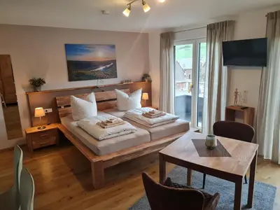 Ein Bett oder Betten in einem Zimmer der Unterkunft Mosel-Auszeit