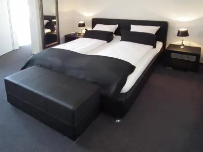 Ein Bett oder Betten in einem Zimmer der Unterkunft Hotel Stadt Coblenz