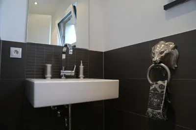 Ein Badezimmer in der Unterkunft Ferienhaus zur Burg Olbruck