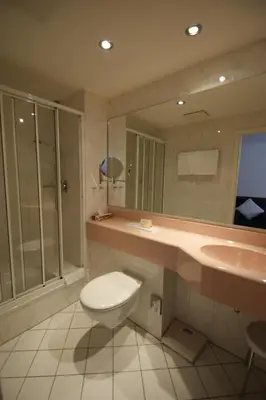 Ein Badezimmer in der Unterkunft Bertricher Hof Hotel Garni
