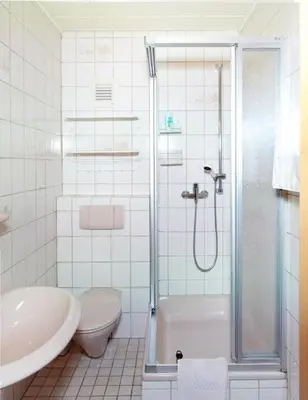 Ein Badezimmer in der Unterkunft Hotel Garni Assion