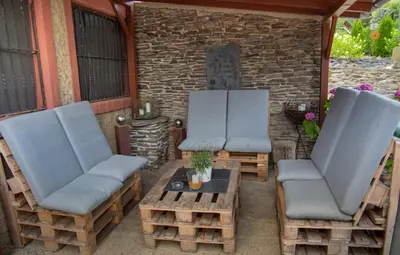 Ein Sitzbereich in der Unterkunft Weinhof Gassen