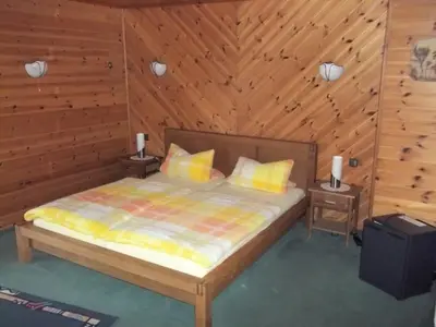 Ein Bett oder Betten in einem Zimmer der Unterkunft Landhaus Wartenstein