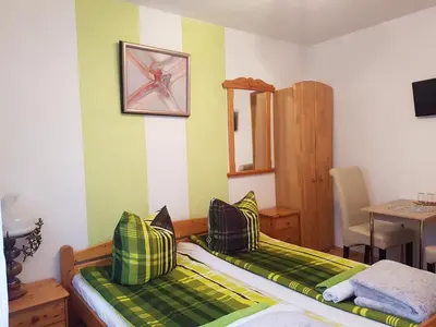 Ein Bett oder Betten in einem Zimmer der Unterkunft Zur Traube