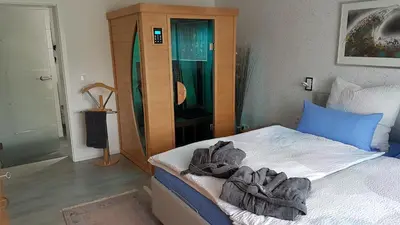 Ein Bett oder Betten in einem Zimmer der Unterkunft Ferienwohnung Brillant am Nationalpark Hunsrück-Hochwald