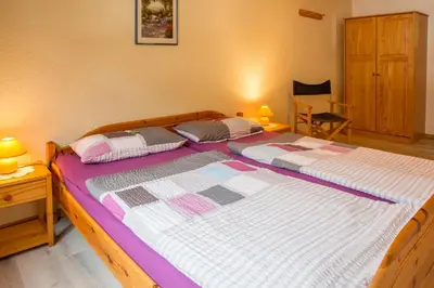 Ein Bett oder Betten in einem Zimmer der Unterkunft Ferienhaus Marie