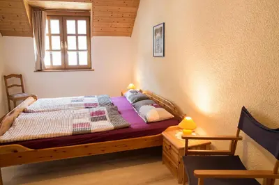 Ein Bett oder Betten in einem Zimmer der Unterkunft Ferienhaus Marie