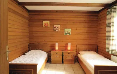 Ein Bett oder Betten in einem Zimmer der Unterkunft Ferienhaus 8 In Thalfang