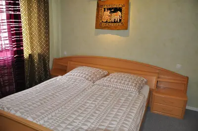 Ein Bett oder Betten in einem Zimmer der Unterkunft T&T Ferienwohnung