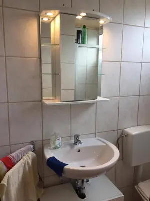 Ein Badezimmer in der Unterkunft Familienfreundliches Ferienhaus mit Waldrand Lage