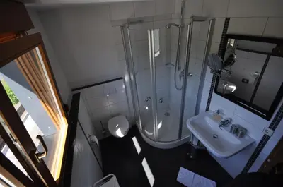 Ein Badezimmer in der Unterkunft Gästezimmer im Weingut Amlinger&Sohn
