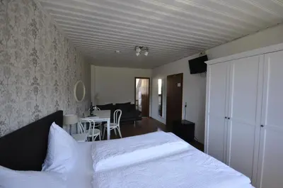 Ein Bett oder Betten in einem Zimmer der Unterkunft Gästezimmer im Weingut Amlinger&Sohn