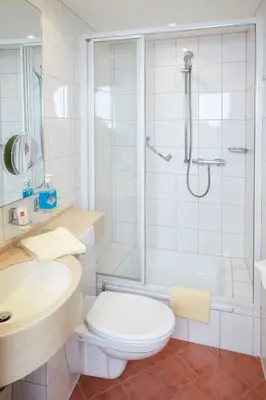 Ein Badezimmer in der Unterkunft Hotel-Restaurant Maas