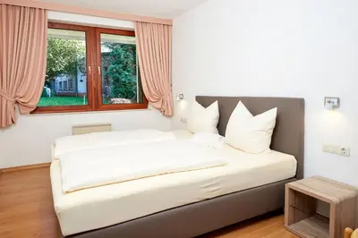 Ein Bett oder Betten in einem Zimmer der Unterkunft Hotel-Restaurant Maas