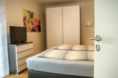 Ein Bett oder Betten in einem Zimmer der Unterkunft Villa Sonnenblick