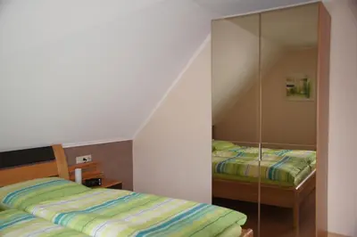 Ein Bett oder Betten in einem Zimmer der Unterkunft Ferienhaus am Flaumbach