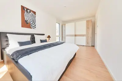 Ein Bett oder Betten in einem Zimmer der Unterkunft Traumblick Burg