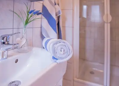 Ein Badezimmer in der Unterkunft FeWo Goebel Beethovenstraße