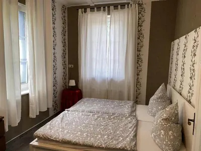 Ein Bett oder Betten in einem Zimmer der Unterkunft Paradiesisch Wohnen - Loreley