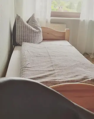Ein Bett oder Betten in einem Zimmer der Unterkunft Ferienwohnung Funk